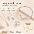 Conjunto de joias em formato de gota, composto por quatro peças em ouro ou prata: brincos, colar, pulseira e anel.